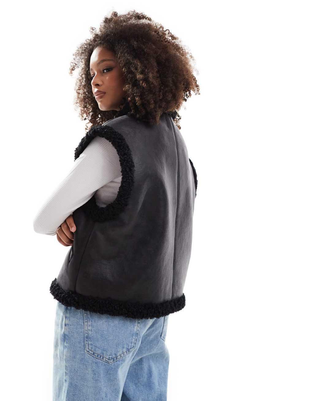 ASOS DESIGN shearling bomber vest in black Product Image