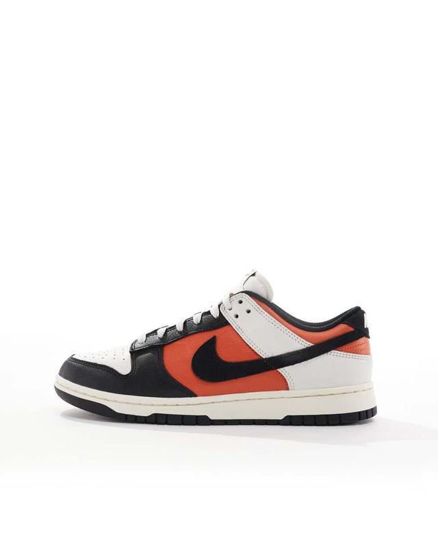 Nike Dunk Low Retro Vintage Coral sneakers in black, white and orange Product Image