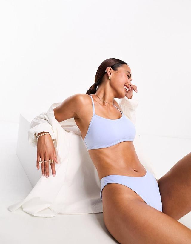 Nike Swimming Essentials sling bikini bottoms in light blue Product Image