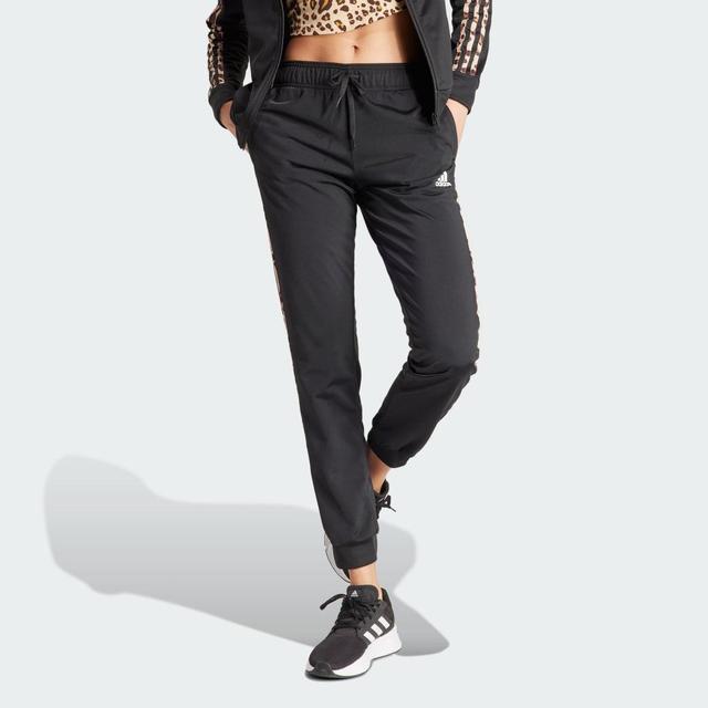 adidas Essentials Animal Print Tricot 3-Stripes Slim Tapered Track Pants Black 2XL Womens Product Image