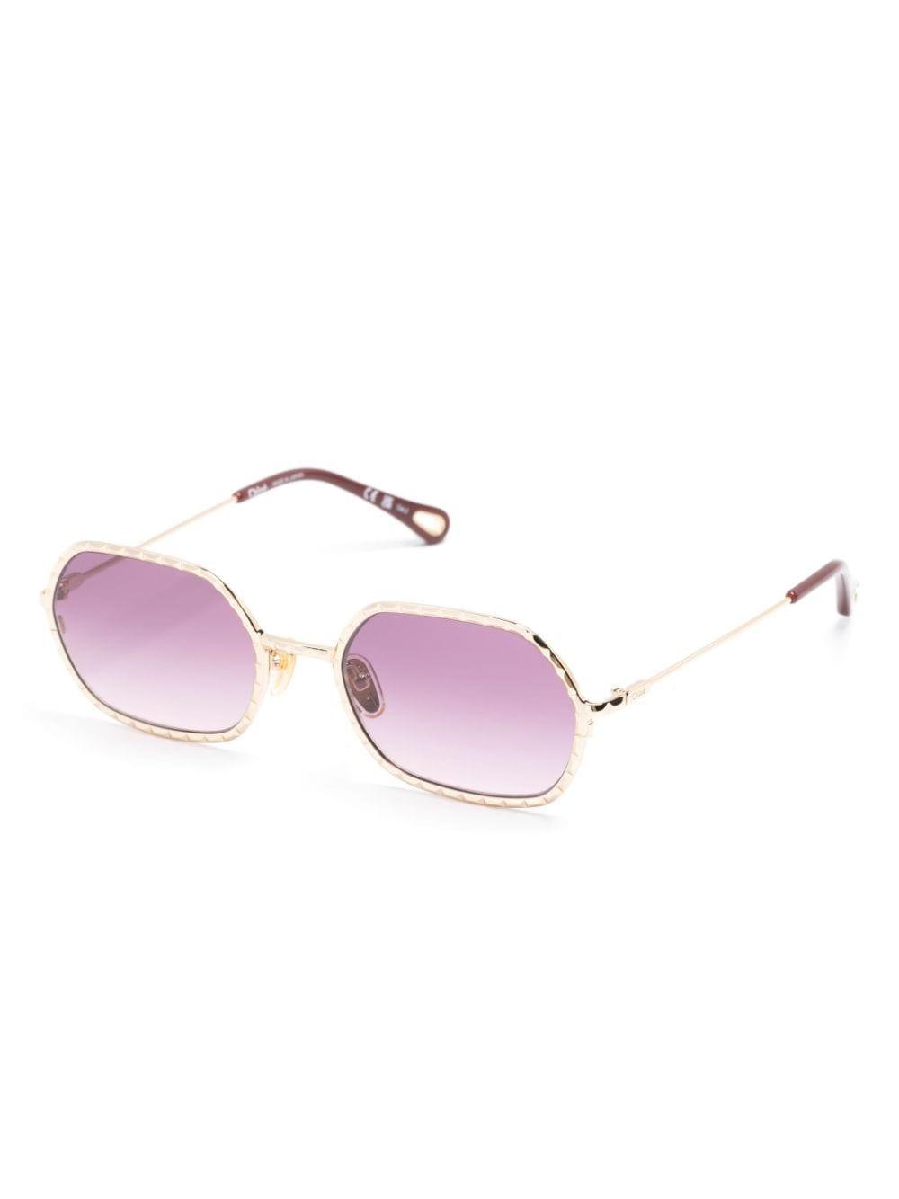 Sonnenbrille Mit Geometrischem Gestell In Gold Product Image