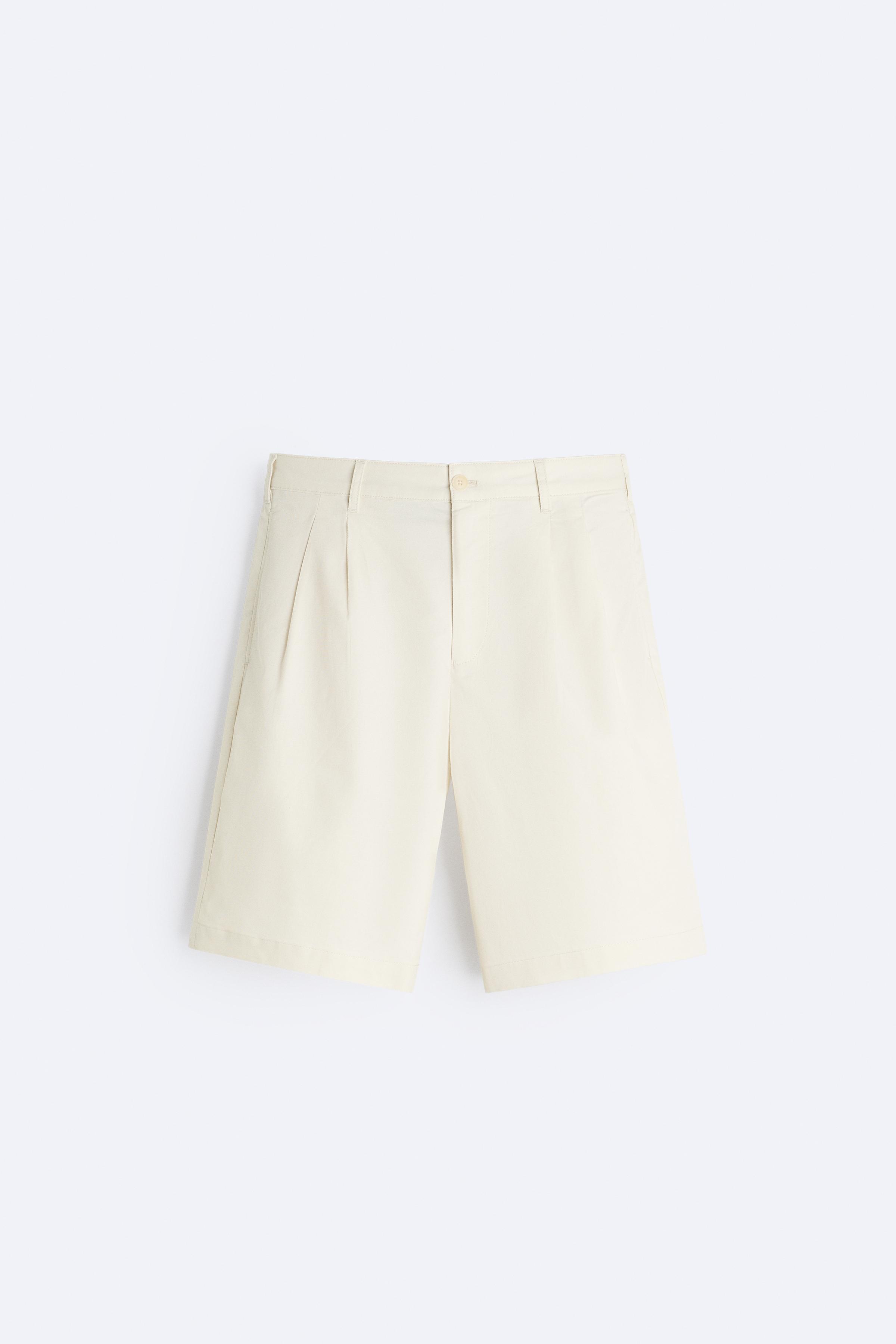 PLEATED WIDE FIT SHORTS Product Image