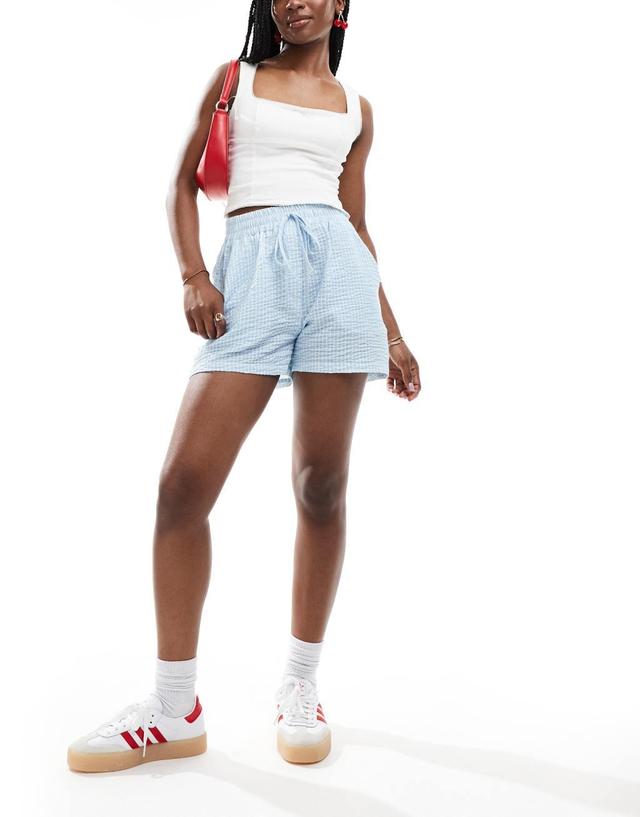 ASOS DESIGN seersucker tie waist shorts in blue & white stripe Product Image