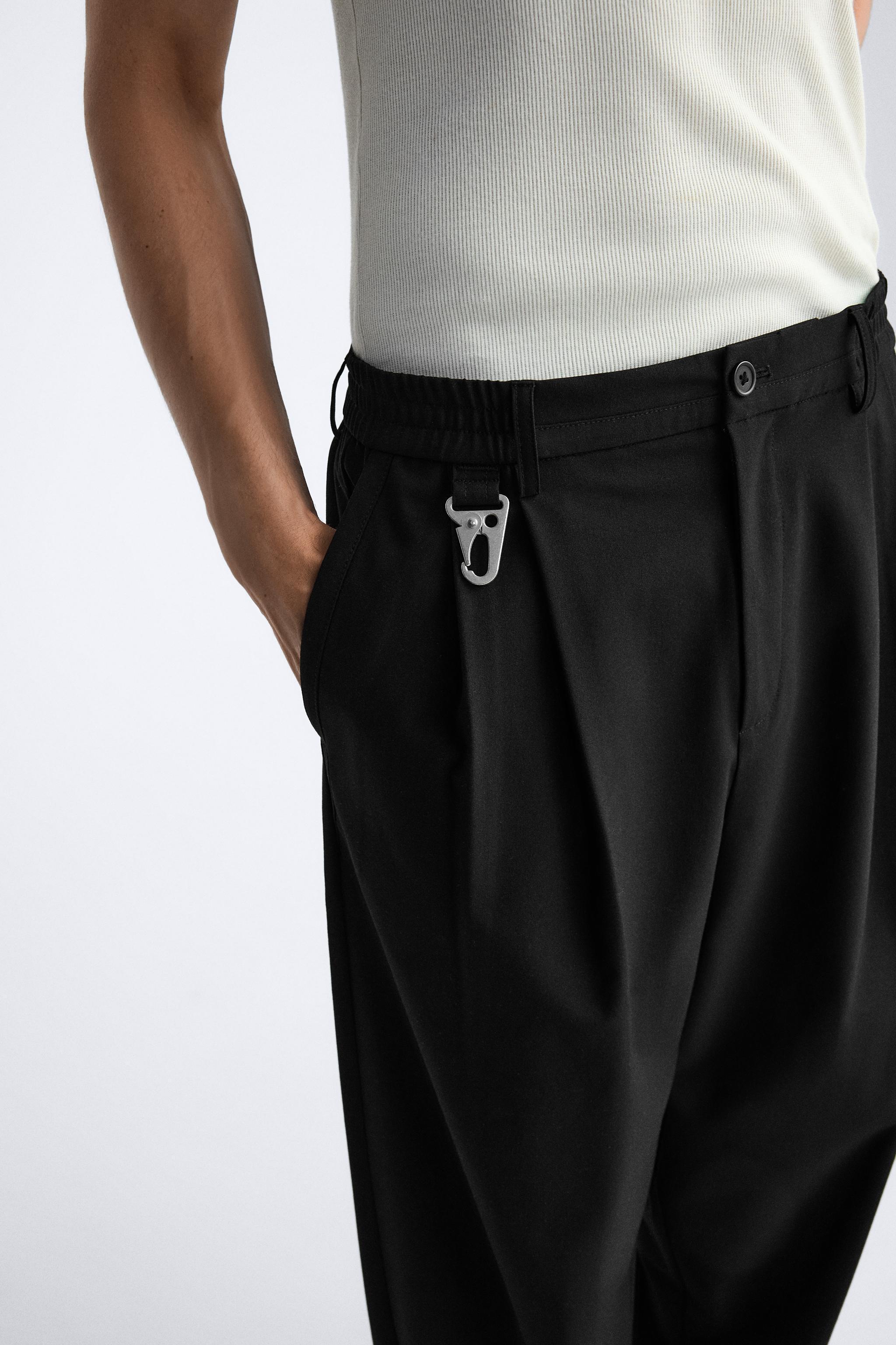 PLEATED WIDE FIT PANTS Product Image