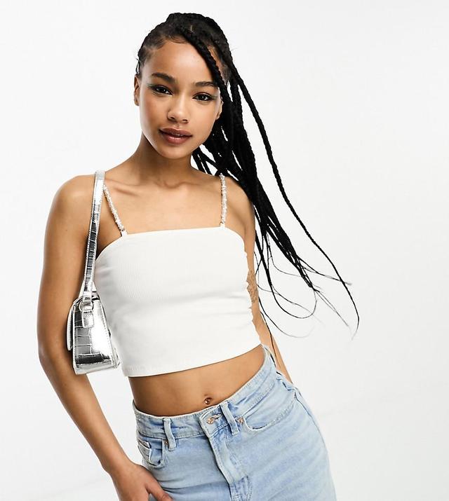 Only Petite crop top with pearl straps in white Product Image