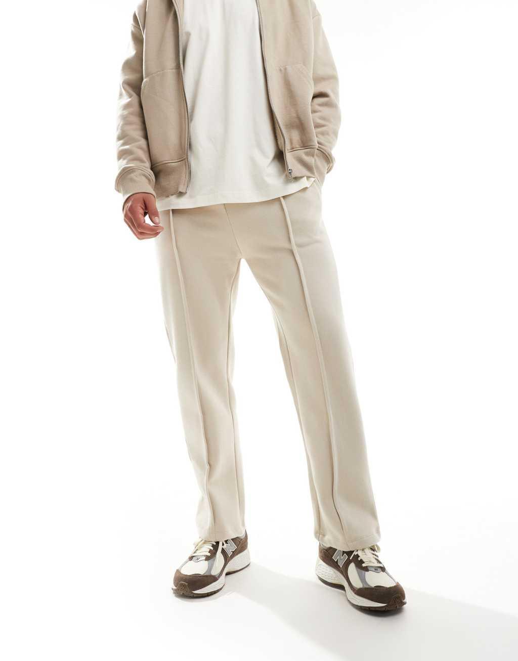 Bershka wide leg pintuck sweatpants in beige Product Image