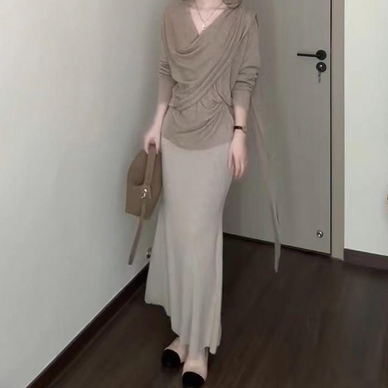 Set: Long-Sleeve V-Neck Plain Wrap Knit Top + High Waist Midi A-Line Skirt Product Image