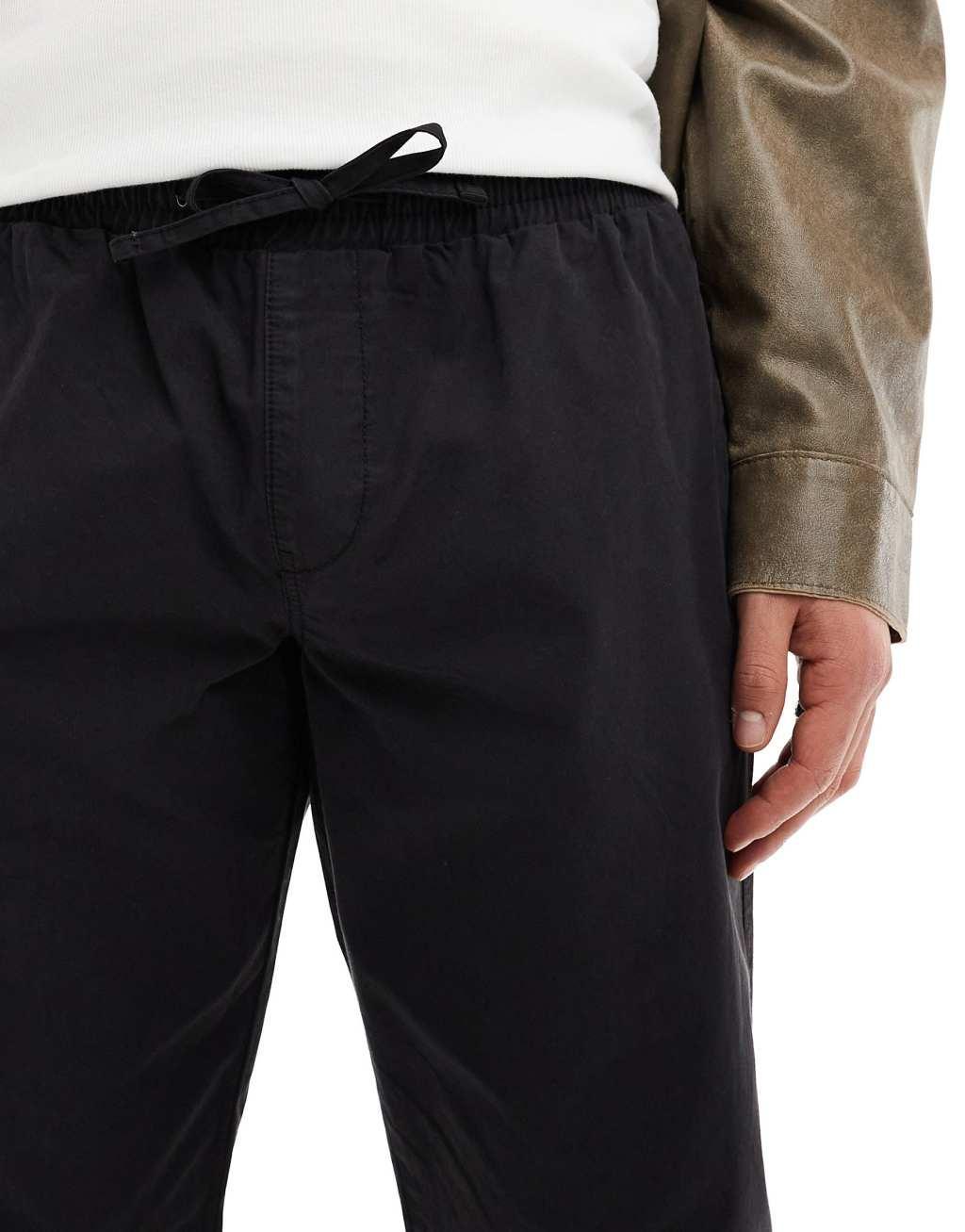 ASOS DESIGN tapered pull on pants in washed black Product Image