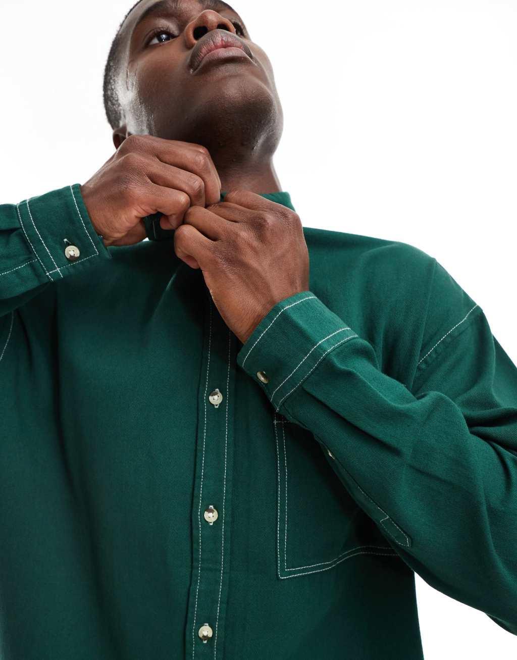 ASOS DESIGN 90s oversized square collar shirt with patch pockets in green Product Image