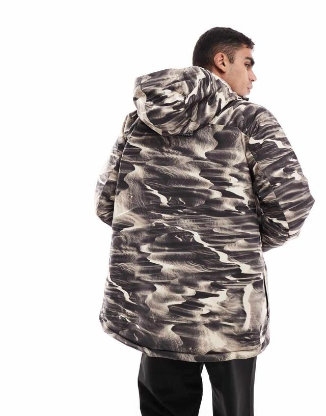 Columbia Winter District printed ski jacket in brown Product Image