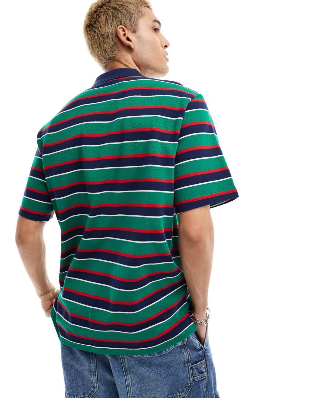 Nike Club striped polo shirt in navy and green Product Image