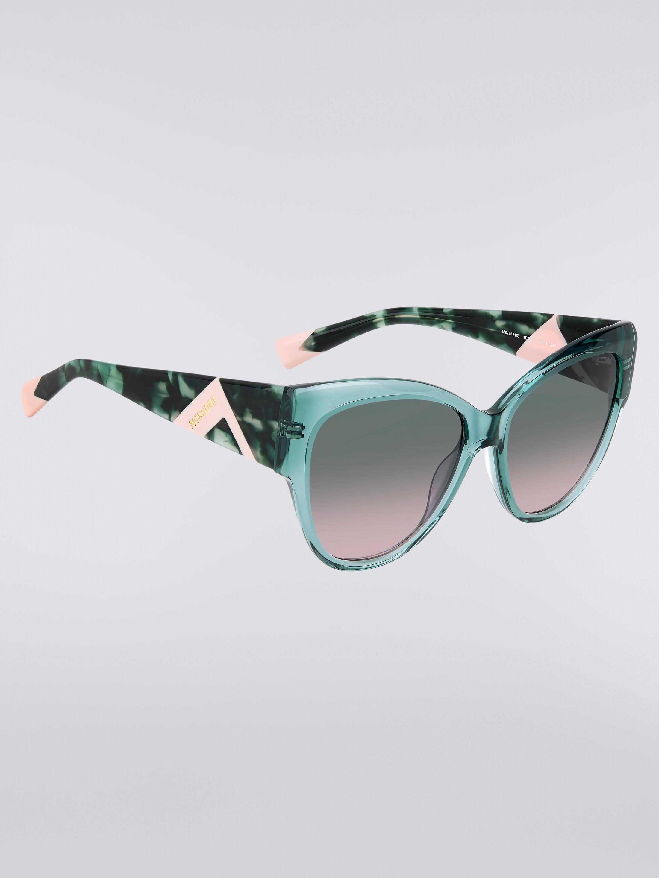 Rounded frame sunglasses with contrasting logo insert Product Image