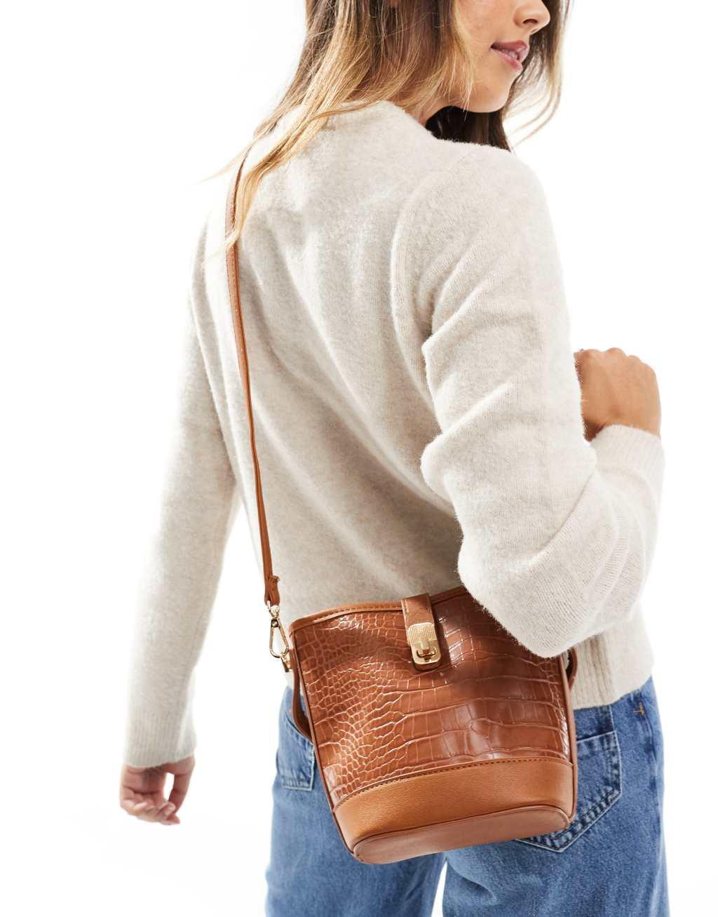 ASOS DESIGN top handle lock crossbody bag in brown Product Image