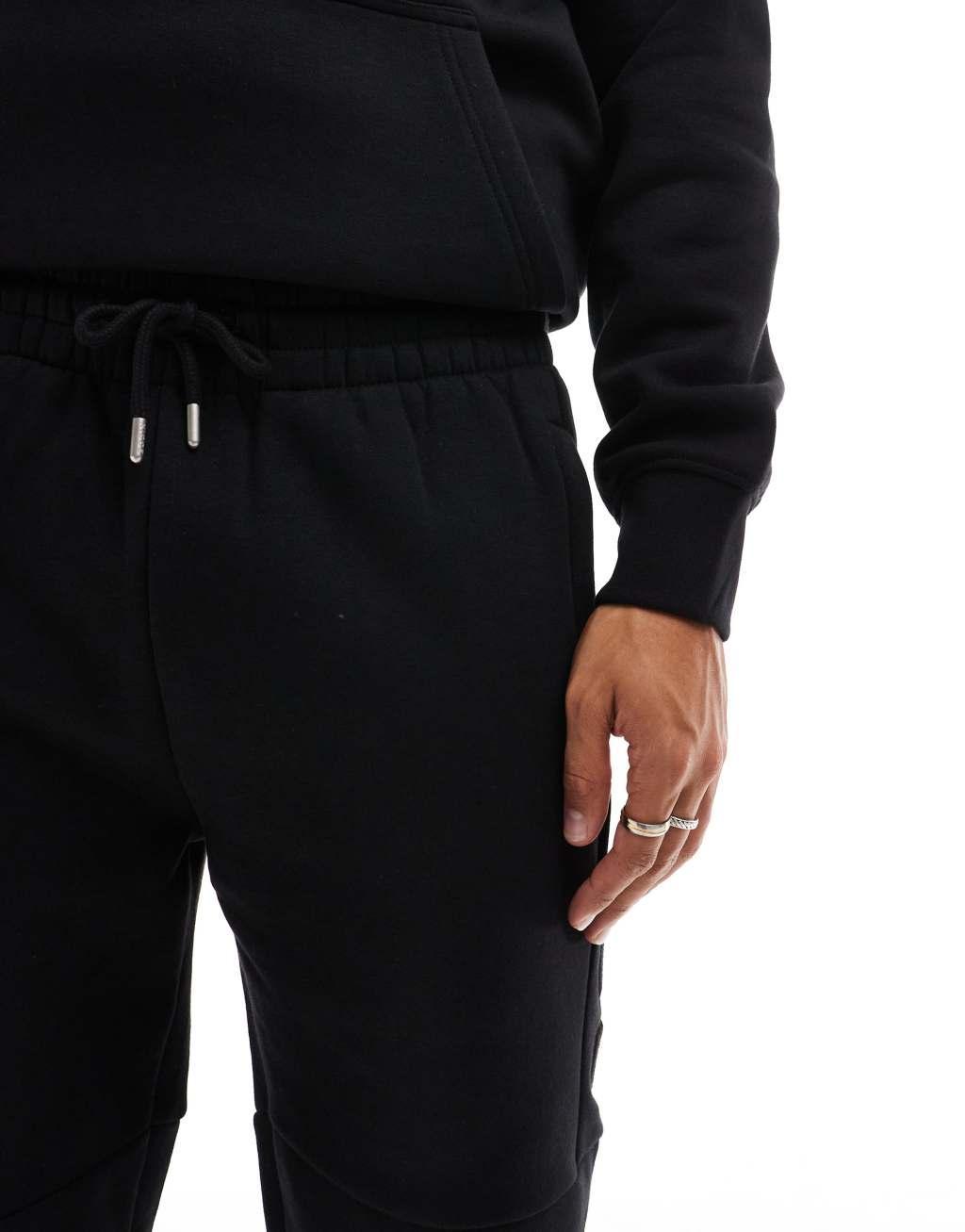 Nicce logo sweatpants in black Product Image