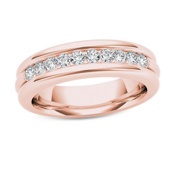 Men's 1/5 CT. T.w. Diamond Groove Wedding Band in 14K Rose Gold Product Image