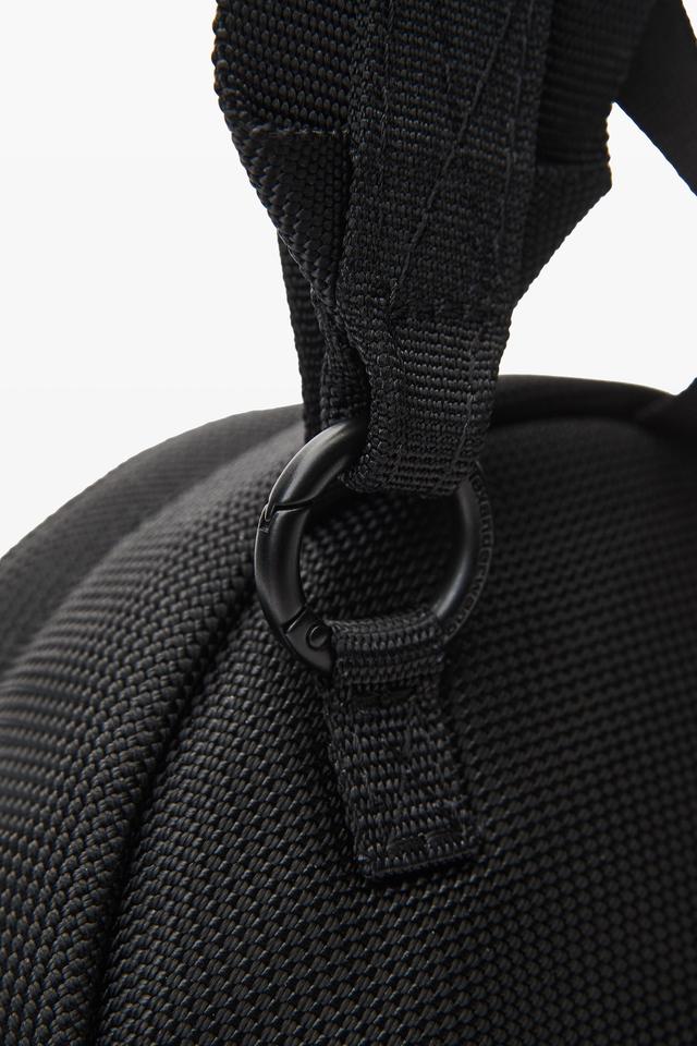 Punch Mini Sling Backpack In Canvas Product Image