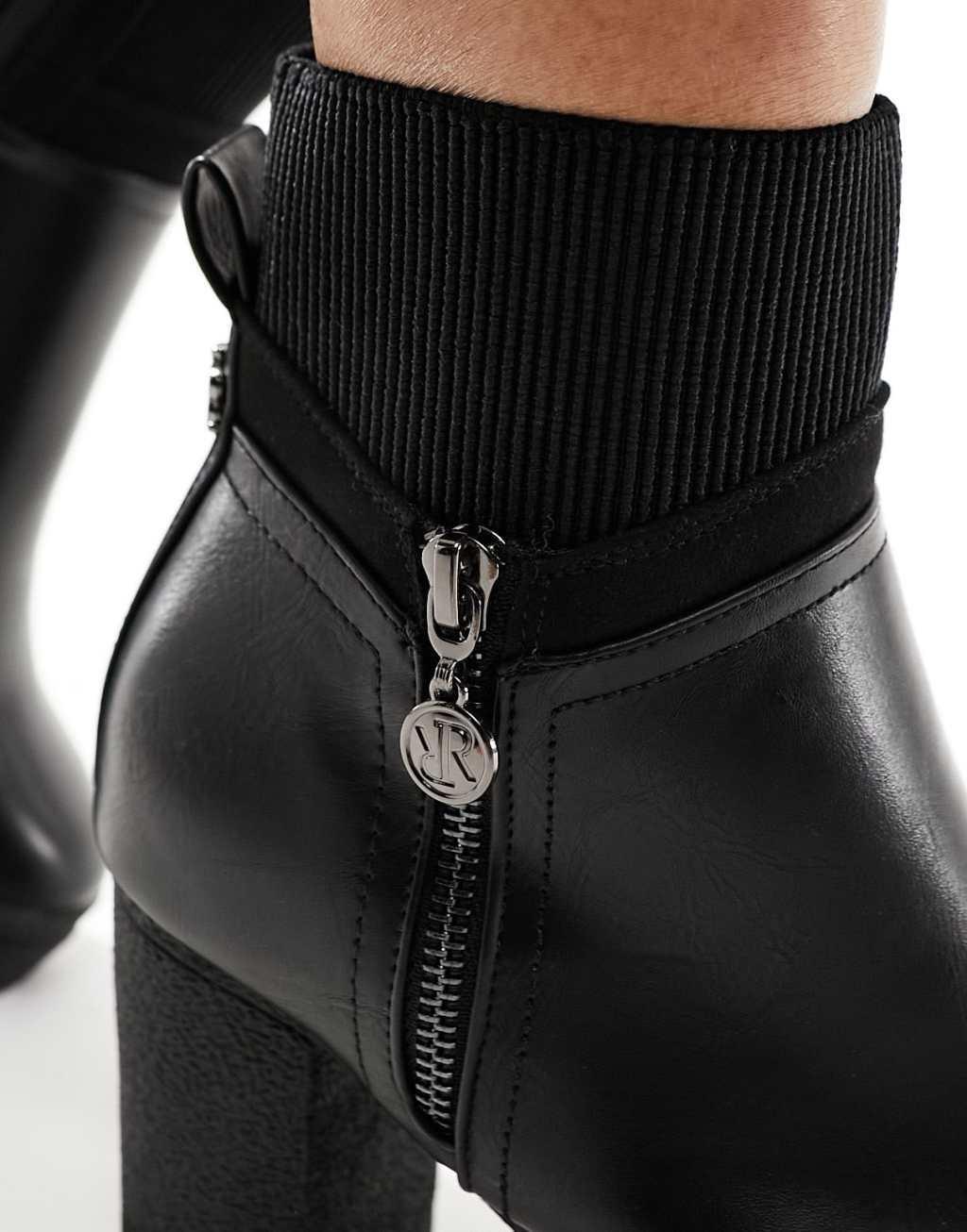 River Island heeled boot with side zip in black Product Image