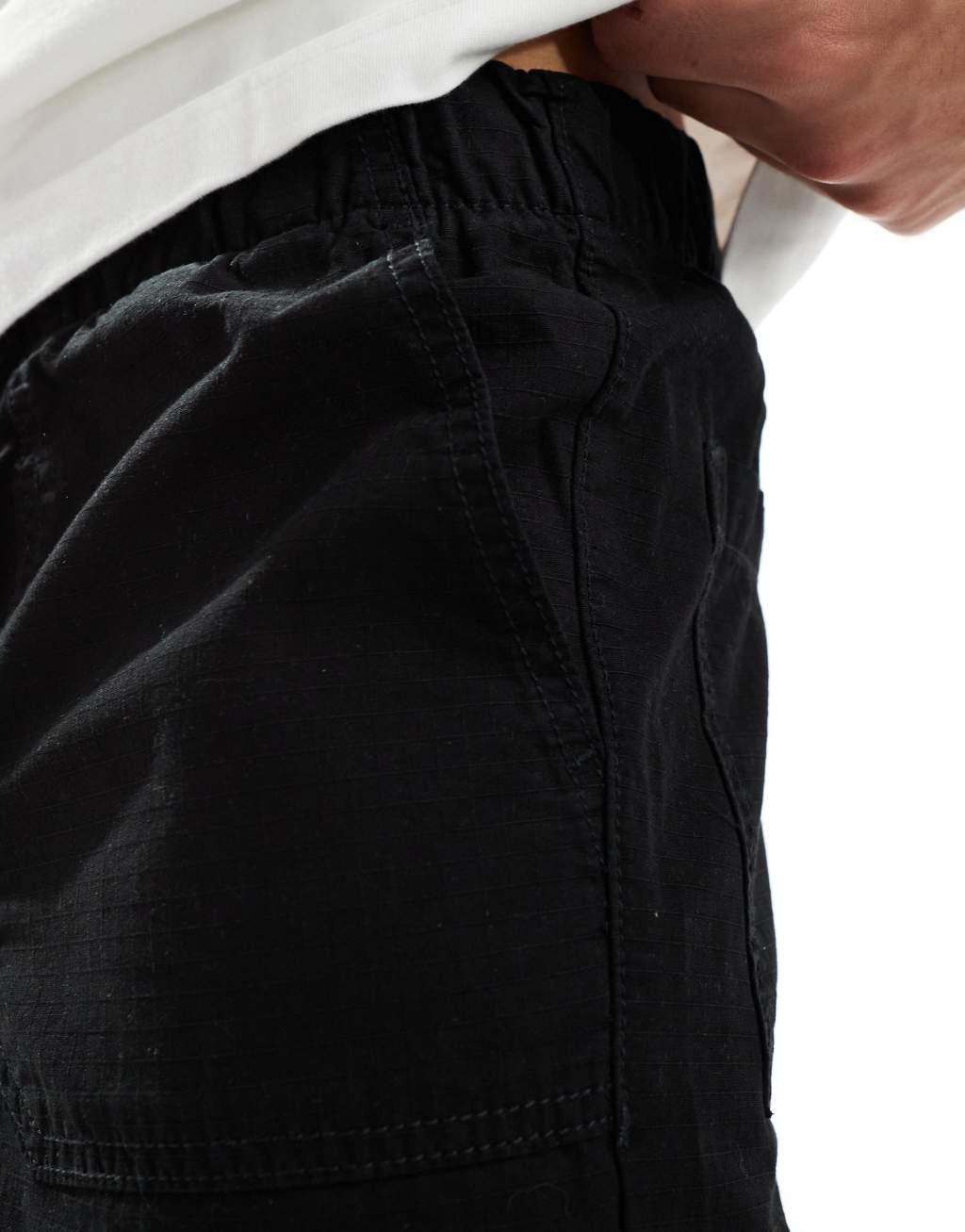 Selected Homme loose fit elastic waistband ripstop pants in black Product Image