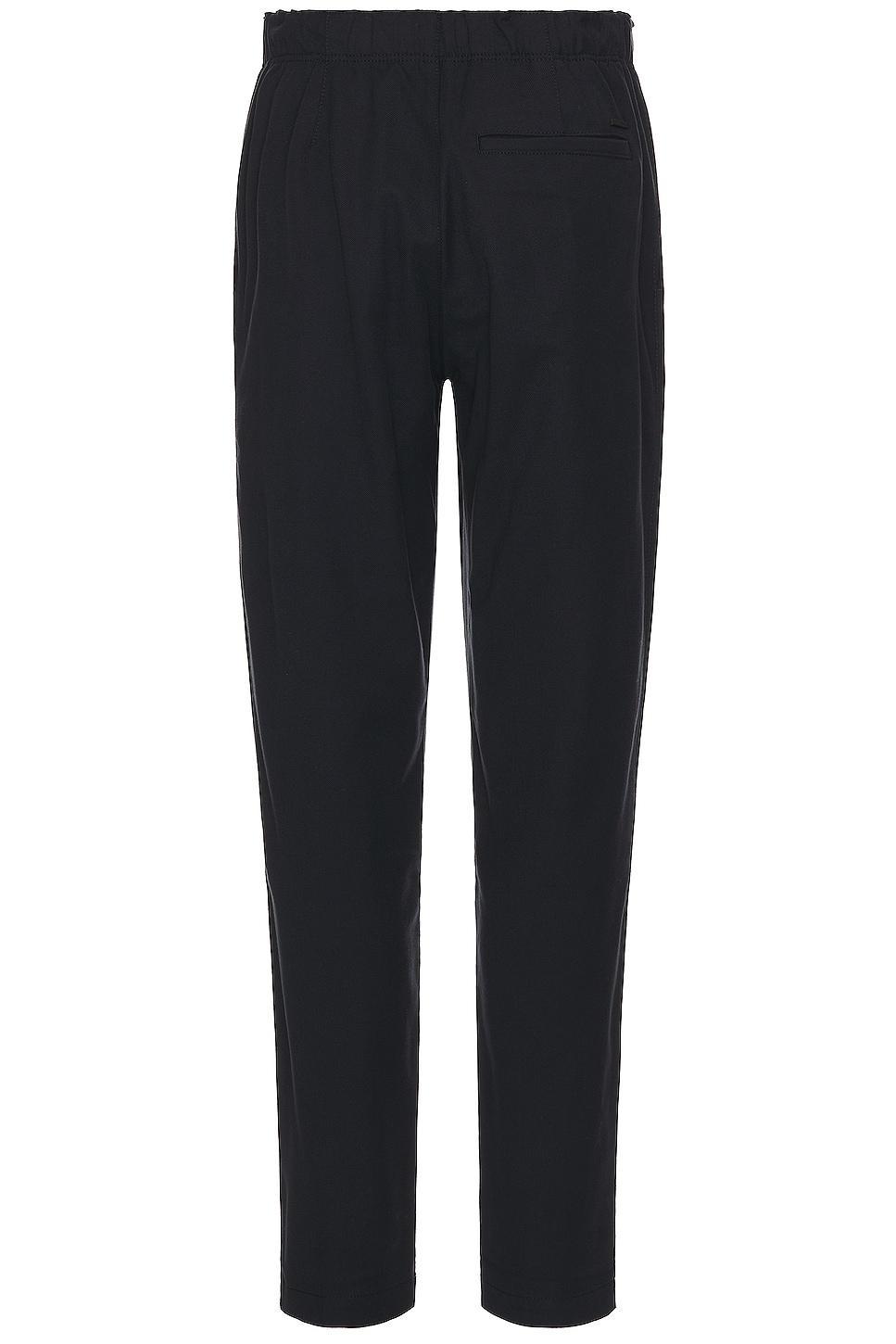 Norse Projects Ezra Relaxed Cotton Wool Twill Trouser in Blue. Product Image