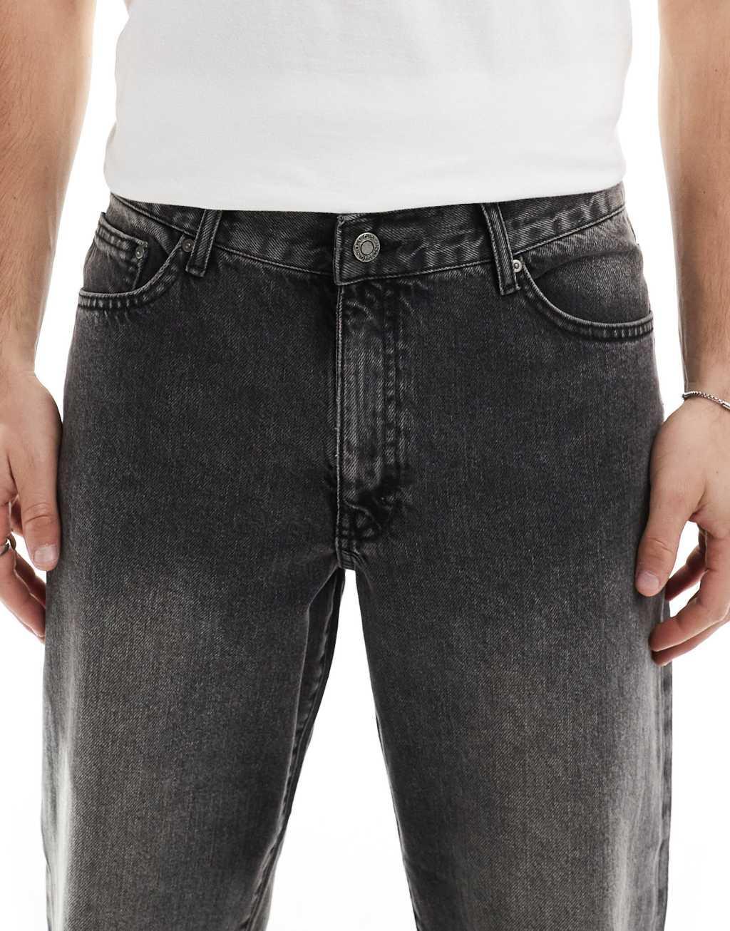 ASOS DESIGN wide flare jeans in washed black Product Image