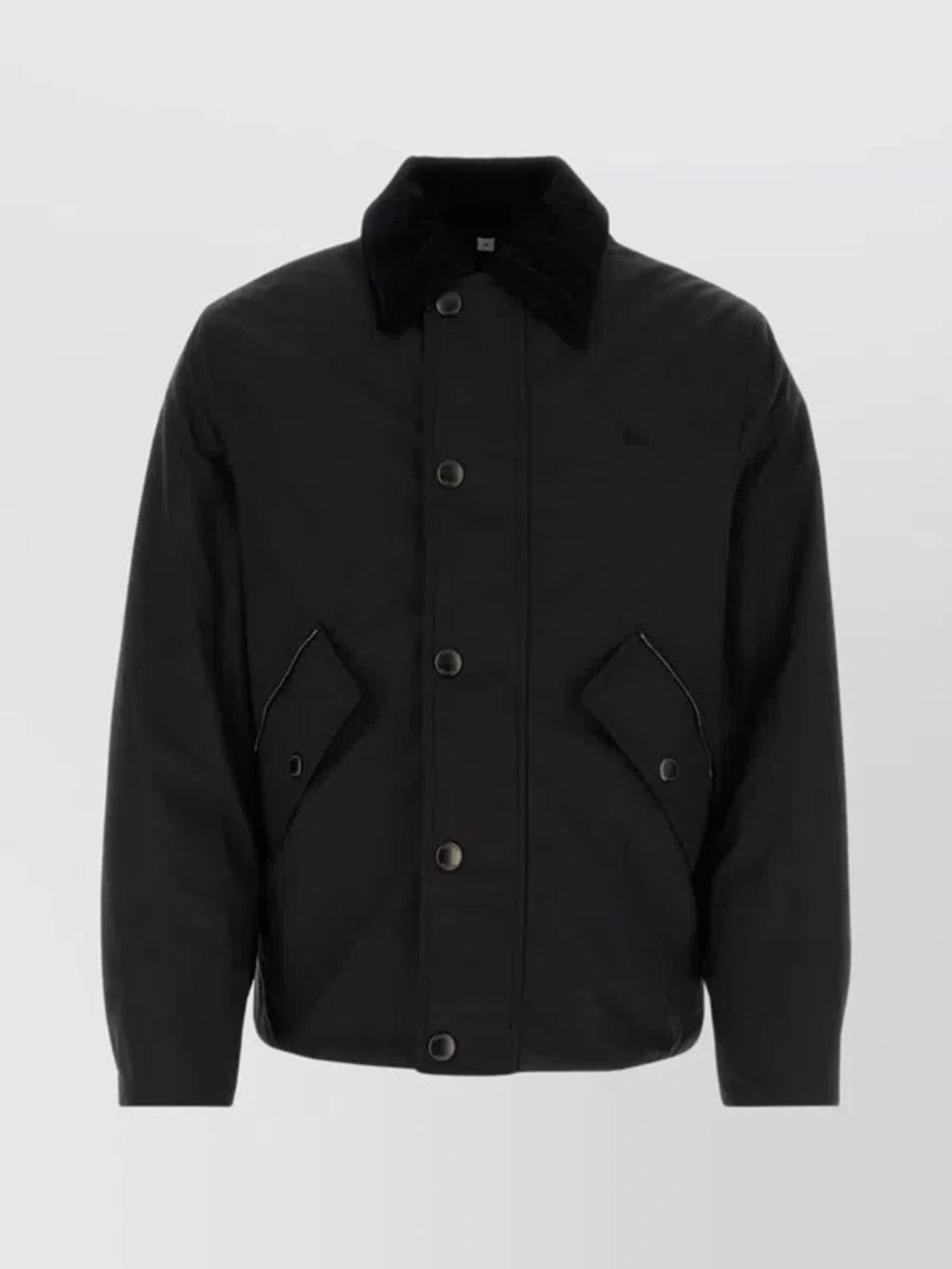 Ribbed Collar Long Sleeves Front Pockets In Black Product Image