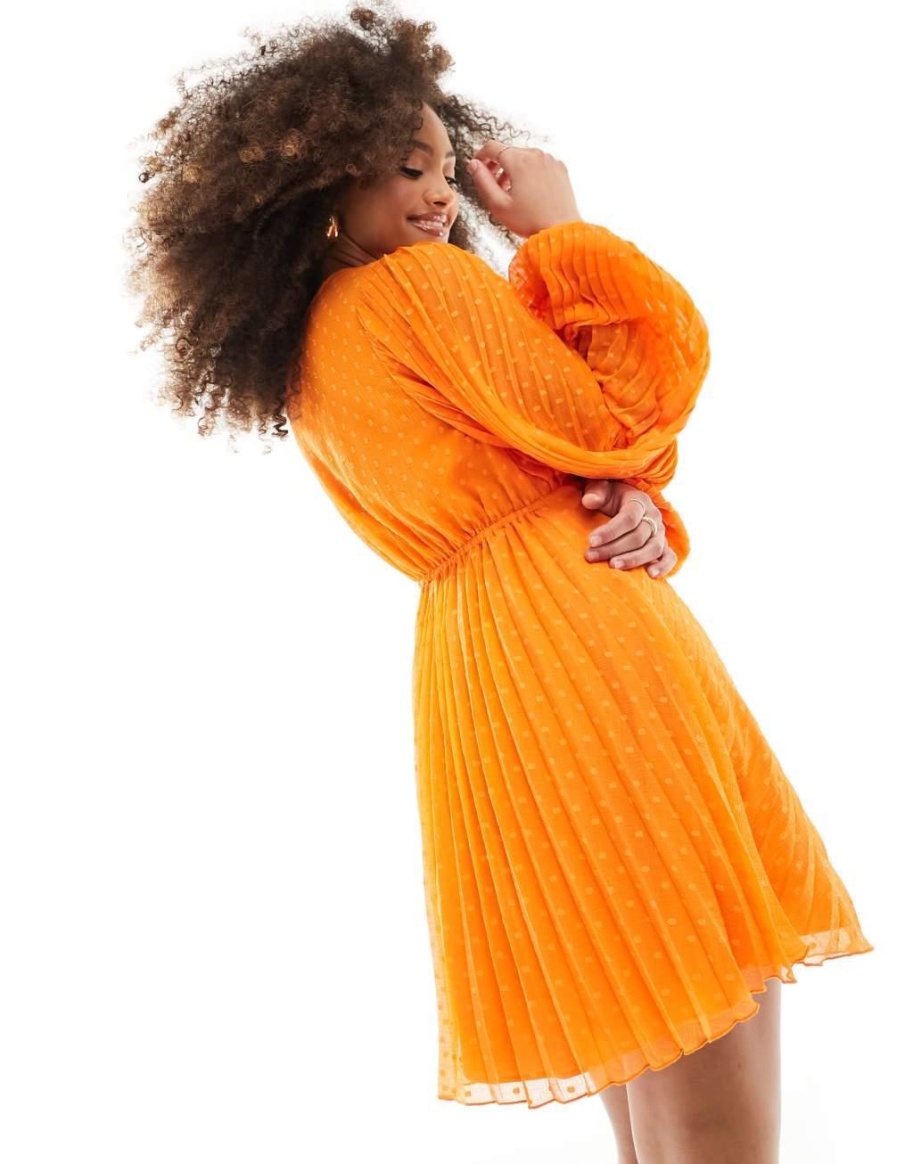 ASOS DESIGN pleated textured chiffon wrap button detail mini dress in bright orange Product Image