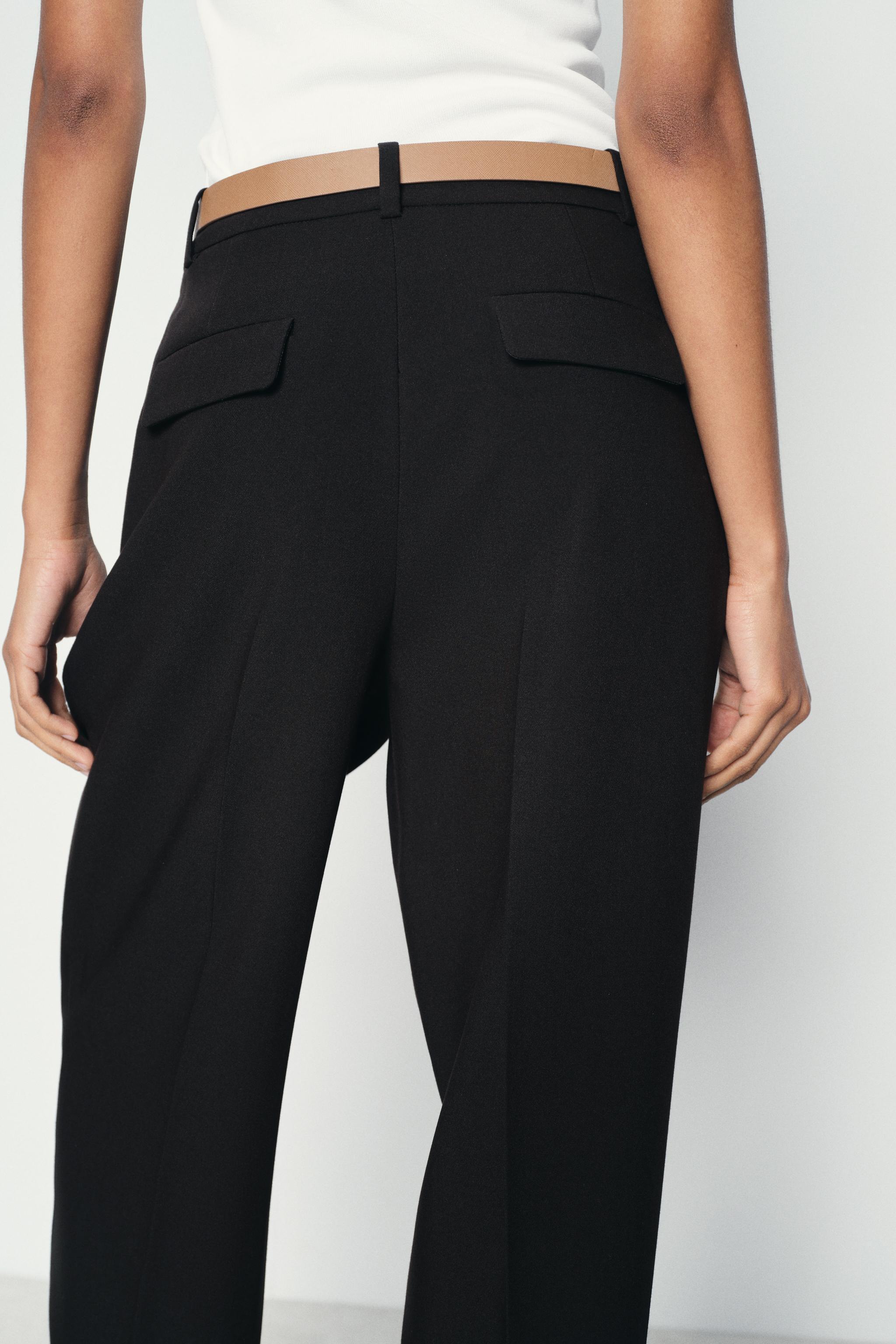 PLEATED PANTS WITH BELT Product Image