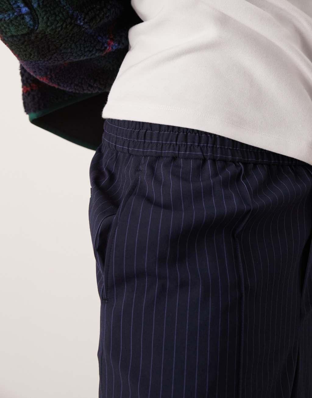 ASOS DESIGN smart wide leg pants in navy pinstripe Product Image