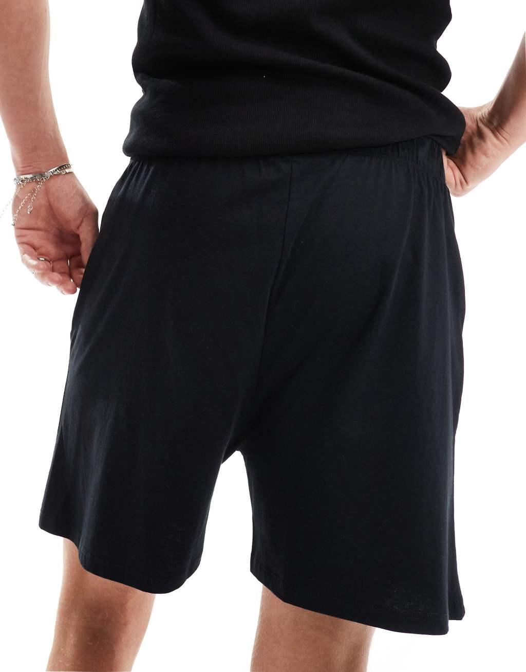 ASOS DESIGN jersey lounge shorts in black Product Image