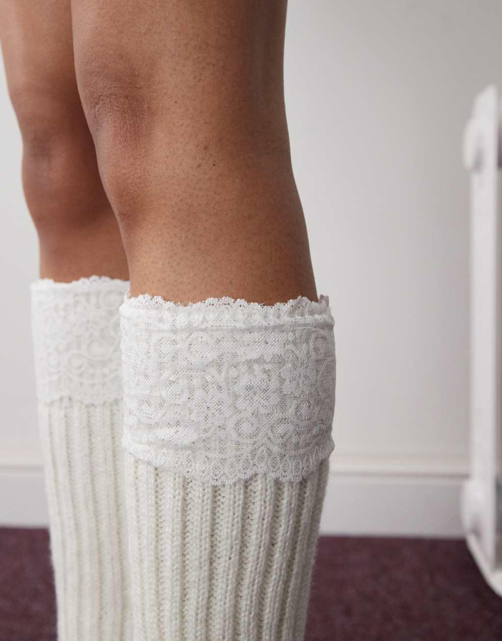 Reclaimed Vintage legwarmers with lace overlay in white Product Image