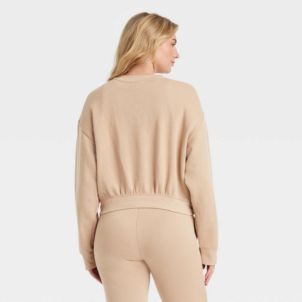 Women's Leisure Studio Pullover Sweatshirt - Universal Thread™ Tan S Product Image