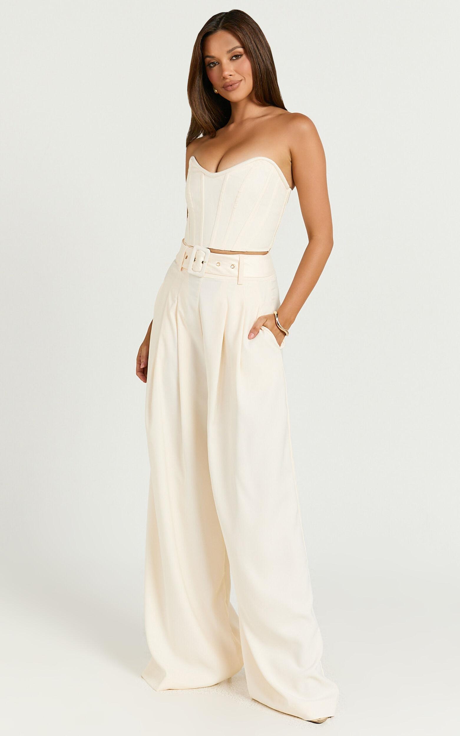 Amalie The Label - Raquelle Pleated Wid Leg Belted Pant in Ivory Product Image