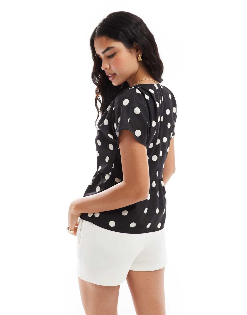 ASOS DESIGN linen look peplum button front top in mono spot Product Image