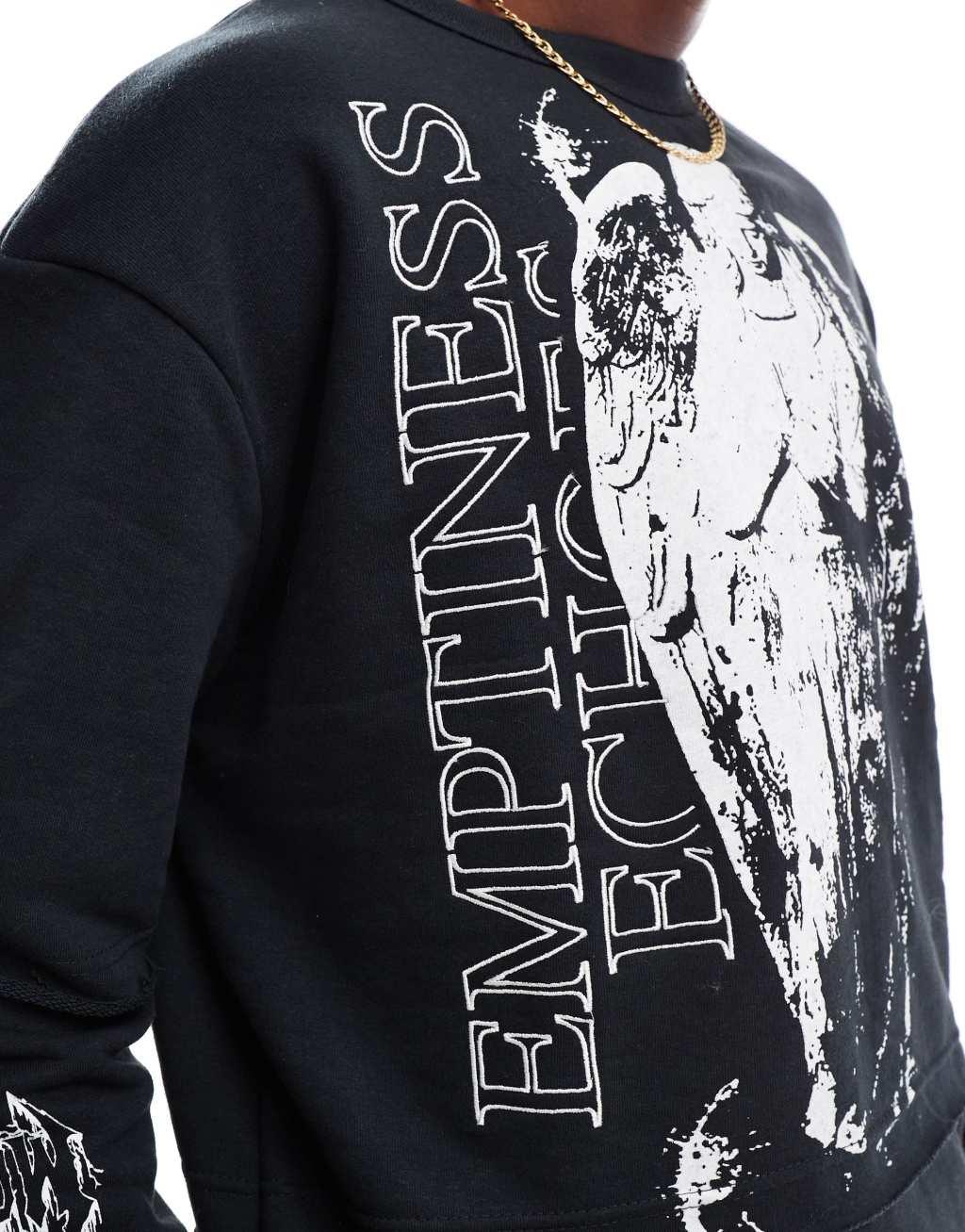 Bershka double layer cherub print sweatshirt in black Product Image