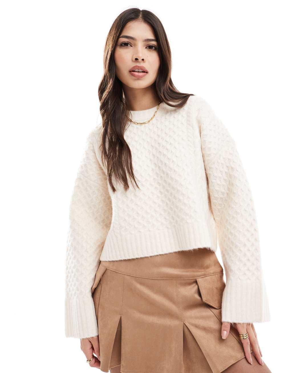 ASOS DESIGN crew neck boxy sweater with wide cuff in cable knit in cream Product Image