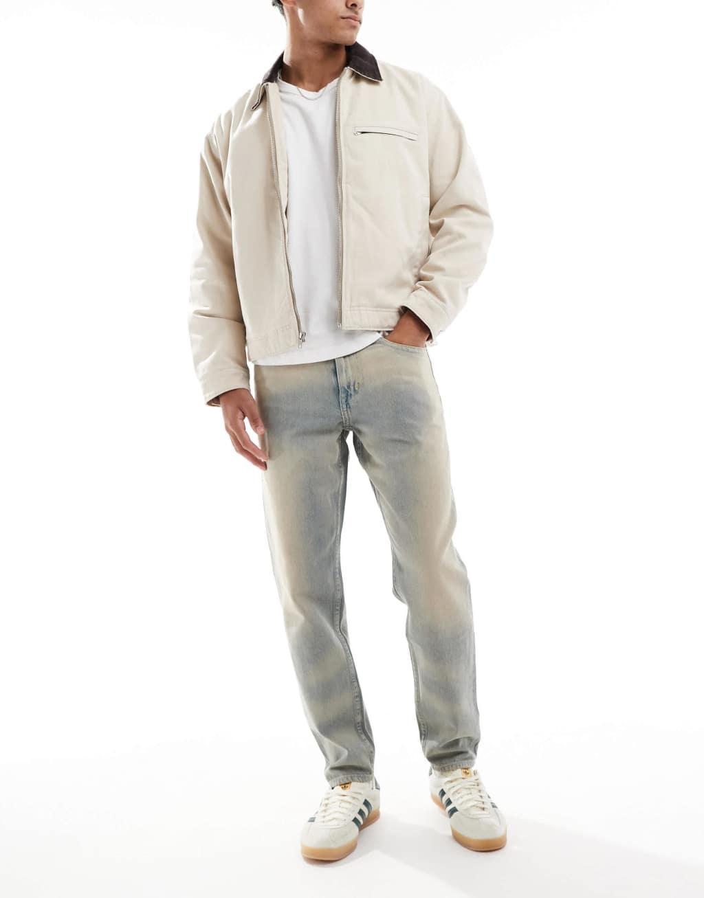 ASOS DESIGN tapered jeans in light wash with tint Product Image