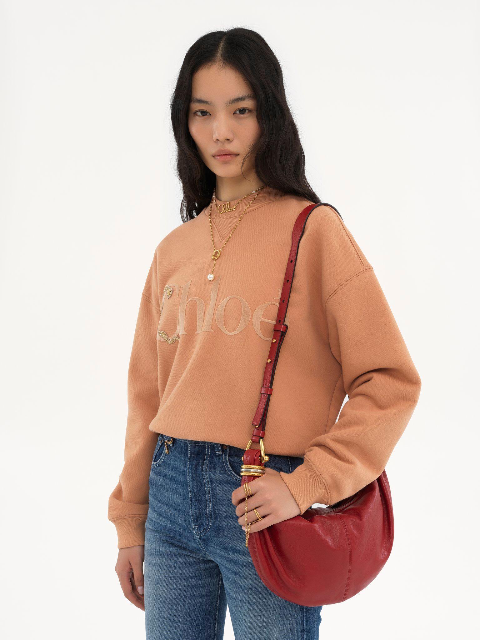 Small Bracelet Hobo bag in grained leather Product Image