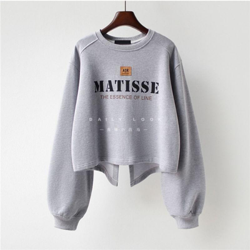 Raglan-Sleeve Crew Neck Lettering Asymmetrical Cropped Sweatshirt Product Image