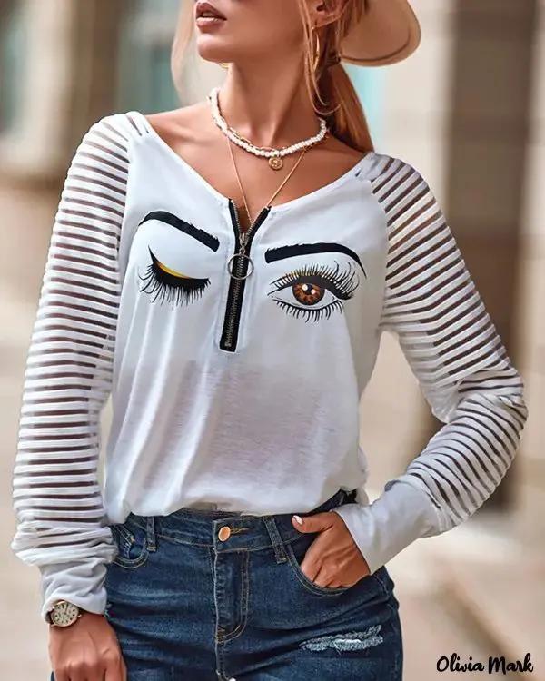 Olivia Mark – Knitted long sleeve top with front zip and eye print Product Image