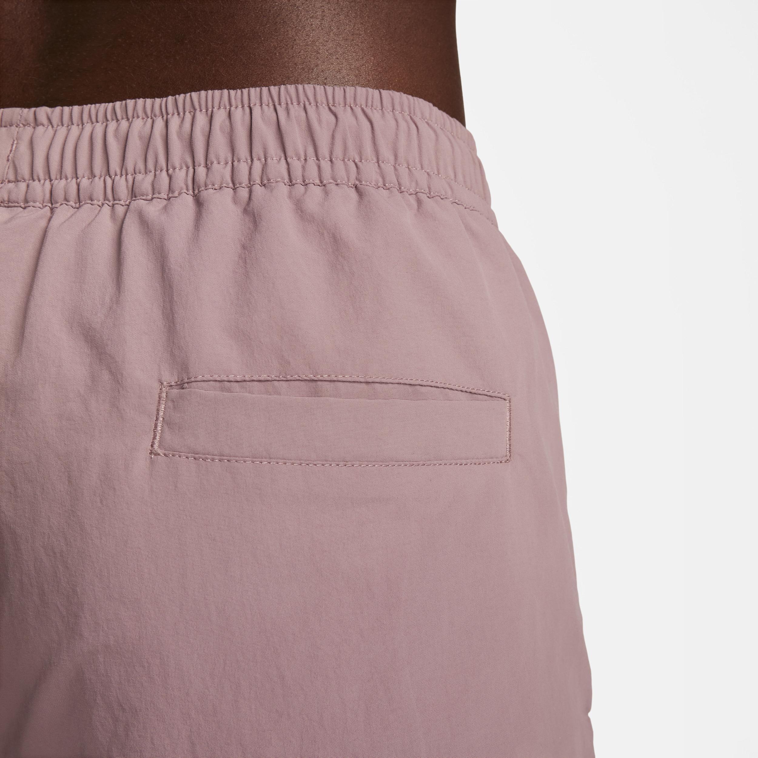 Nike Trend woven baggy parachute pants in smokey mauve Product Image