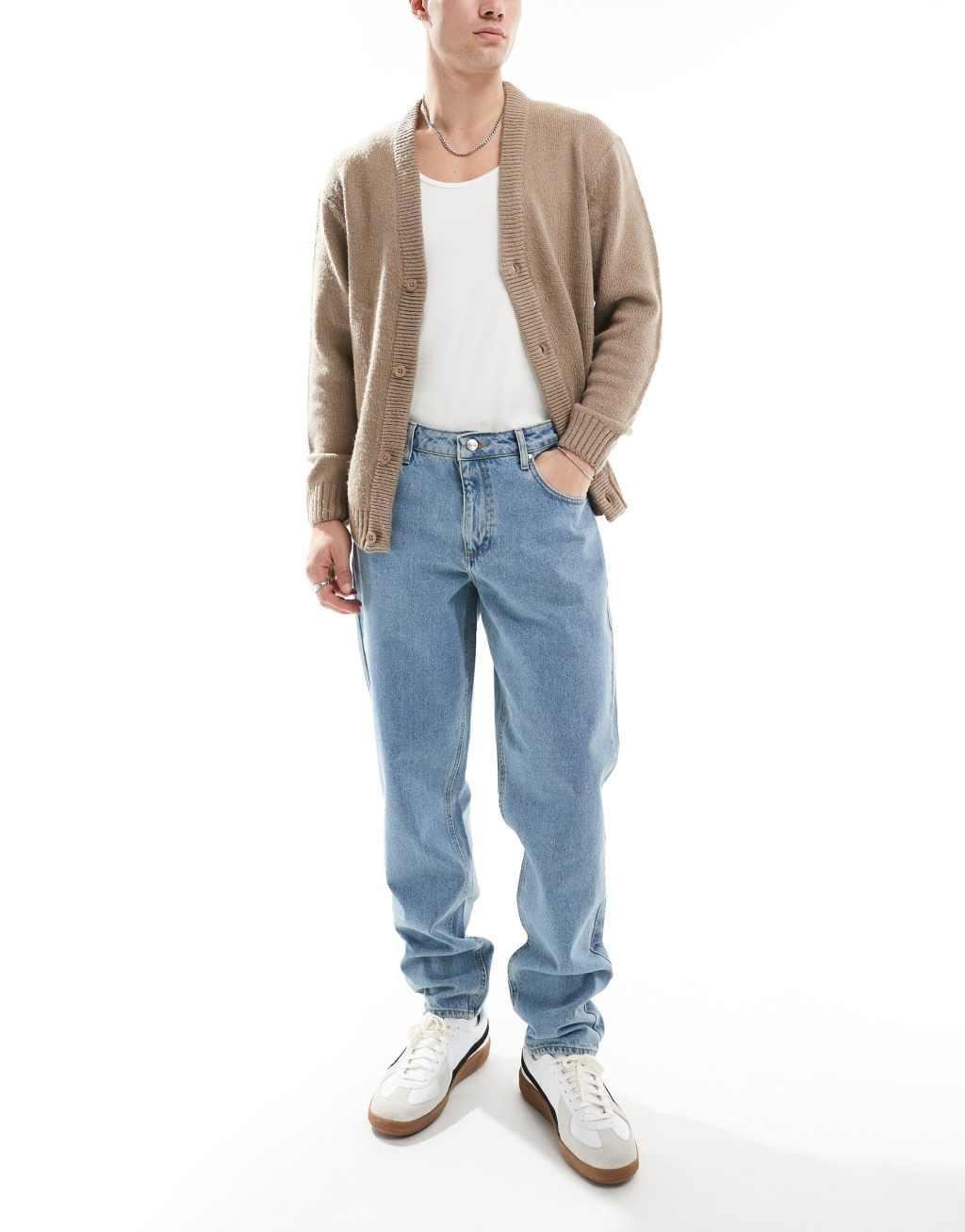 ASOS DESIGN tapered fit jeans in mid wash blue   Product Image