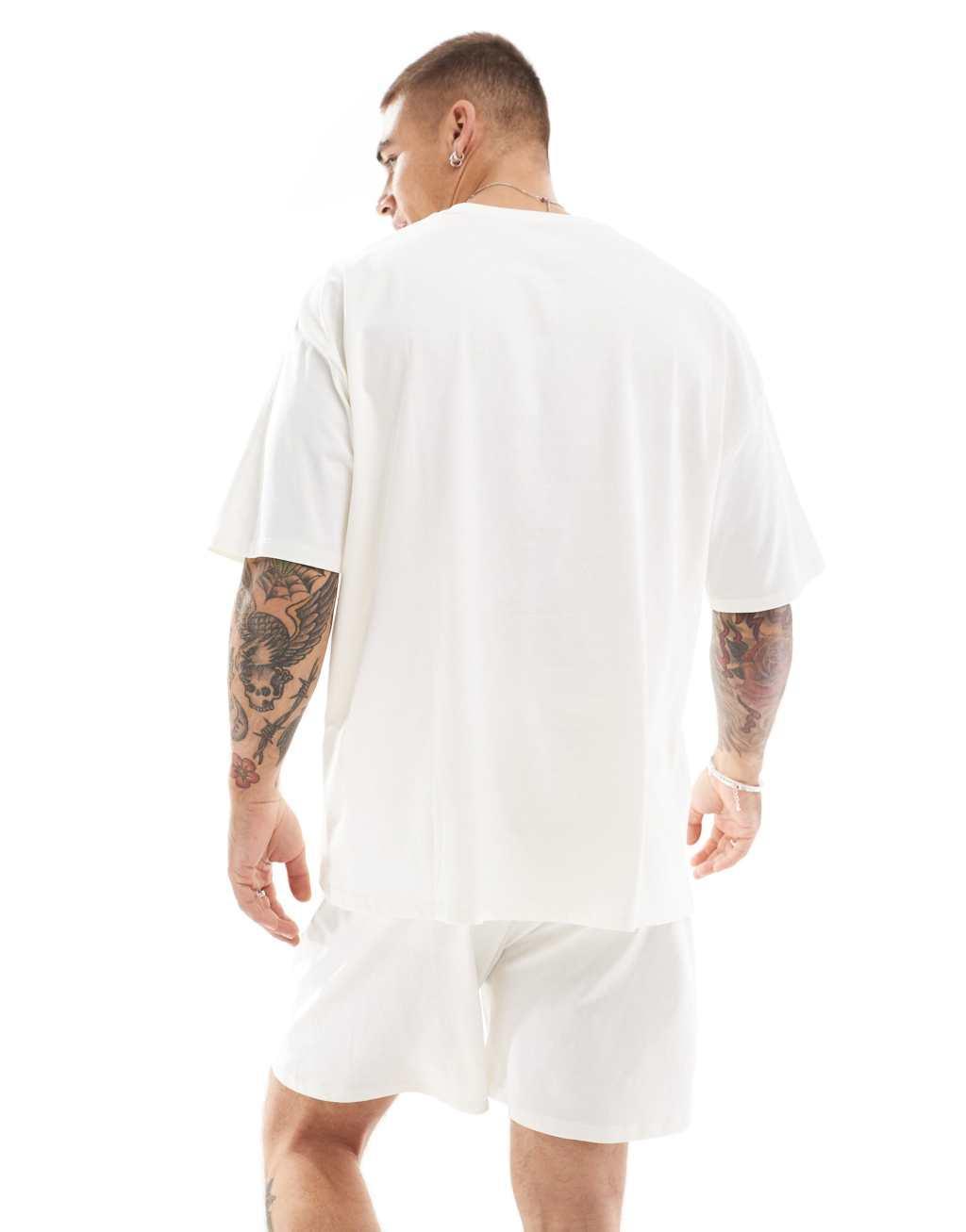 ASOS DESIGN pajama set with I love my bed graphic in cream Product Image