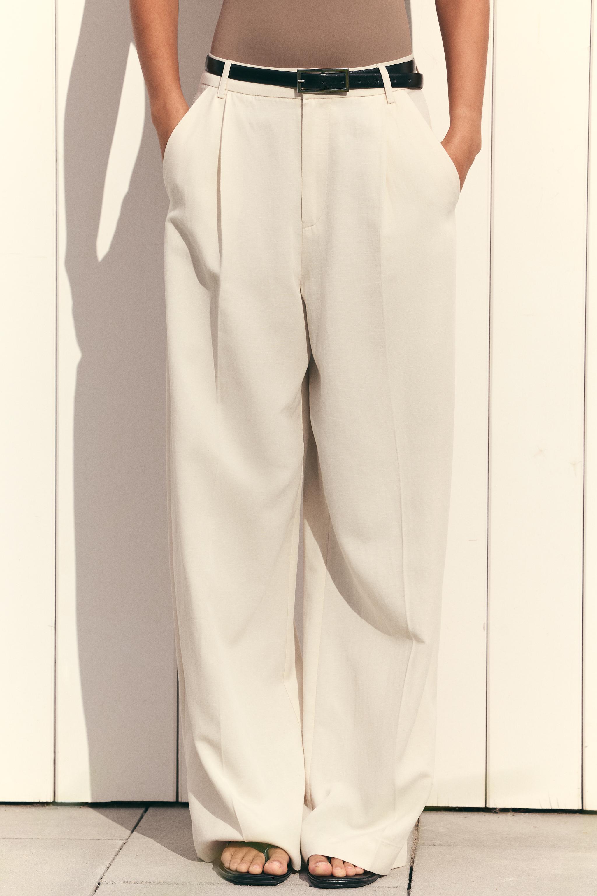 FLOWY PLEATED PANTS Product Image