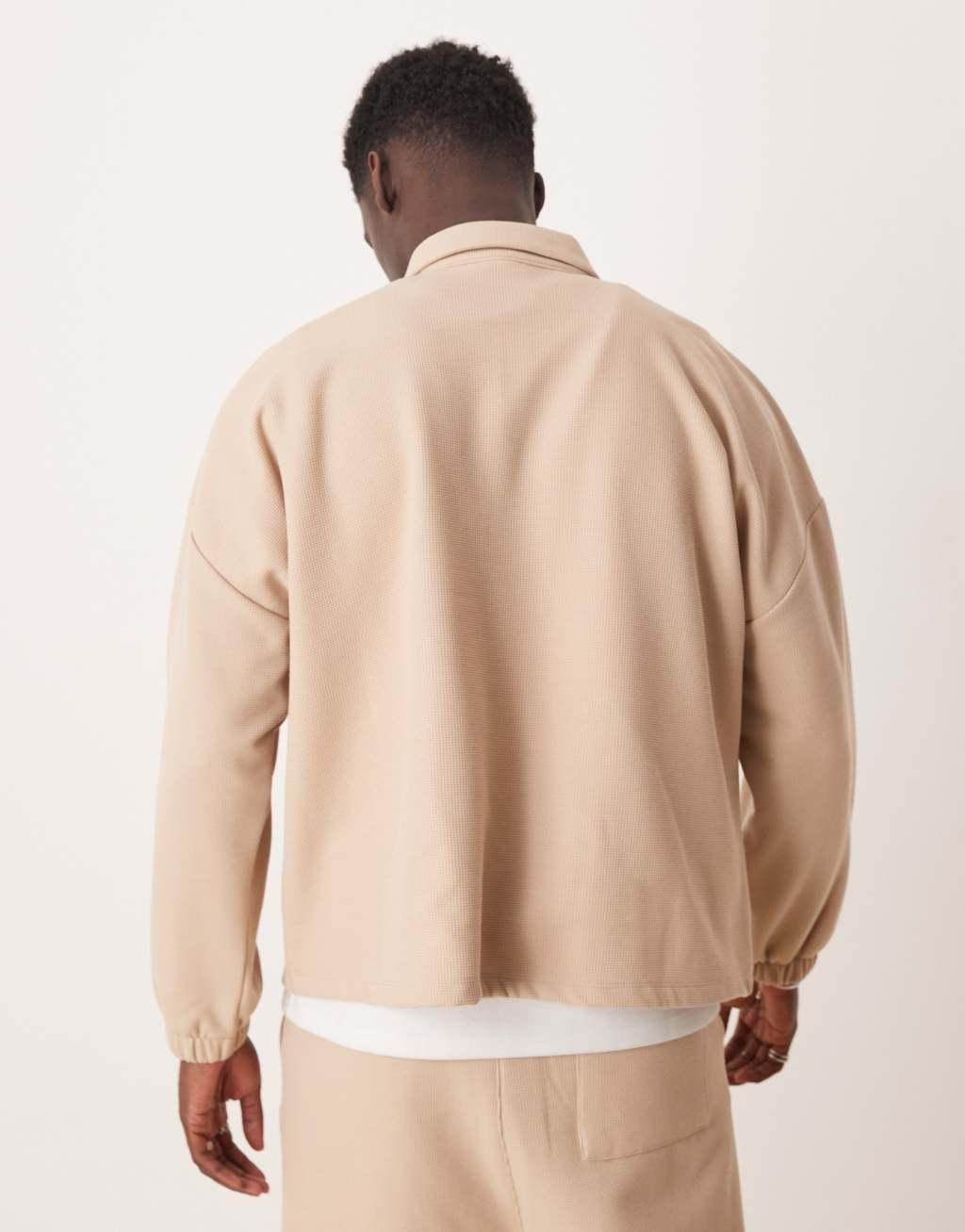 ASOS DESIGN oversized dropped shoulder polo sweater in brush back waffle in beige - part of a set Product Image