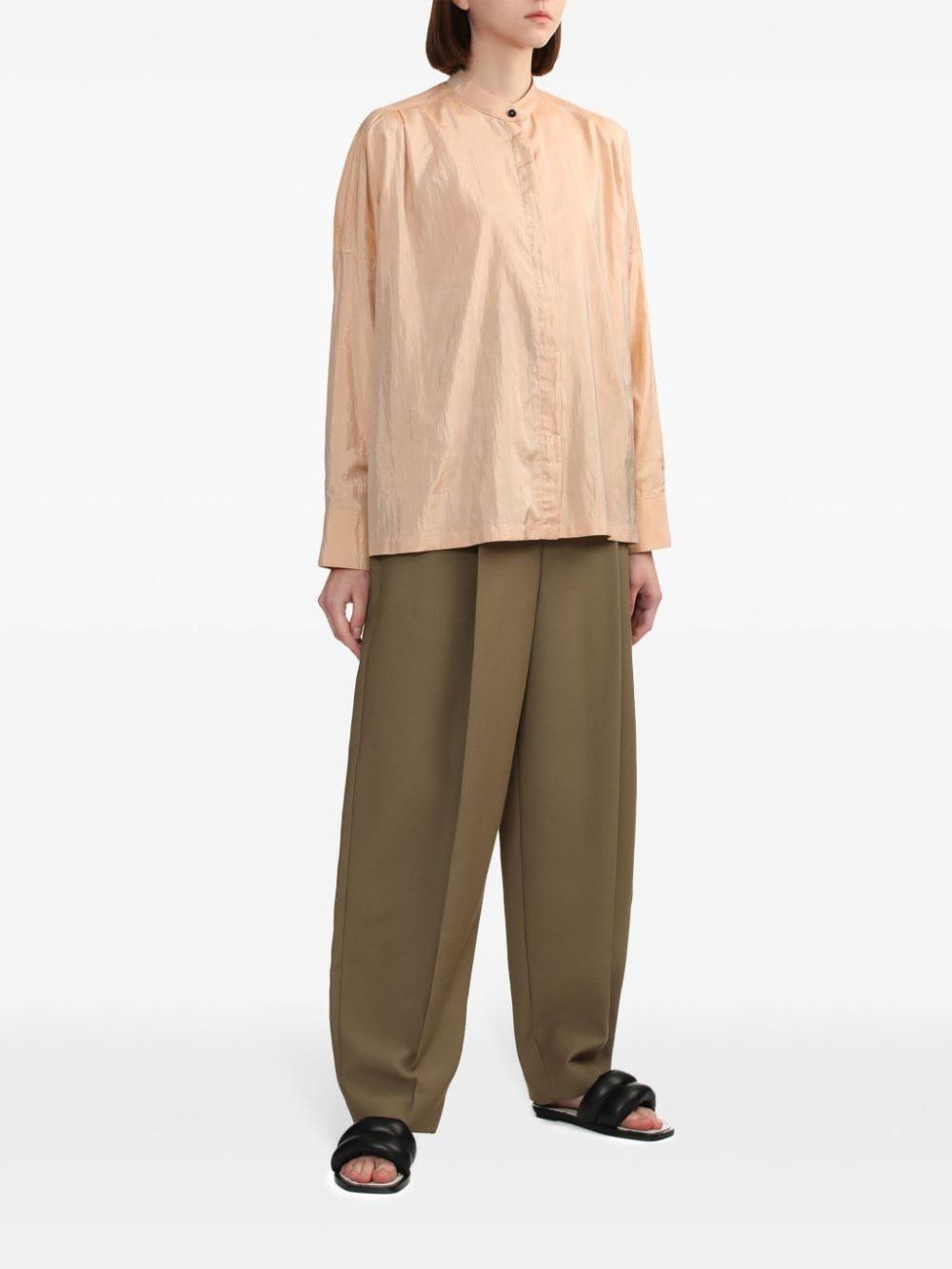 KHAITE Ashford Pleated Woven Tapered Pants In Brown Product Image