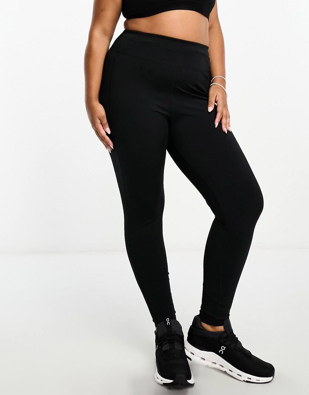 ASOS 4505 CurveIcon running tie waist gym leggings with phone pocket in navy Product Image