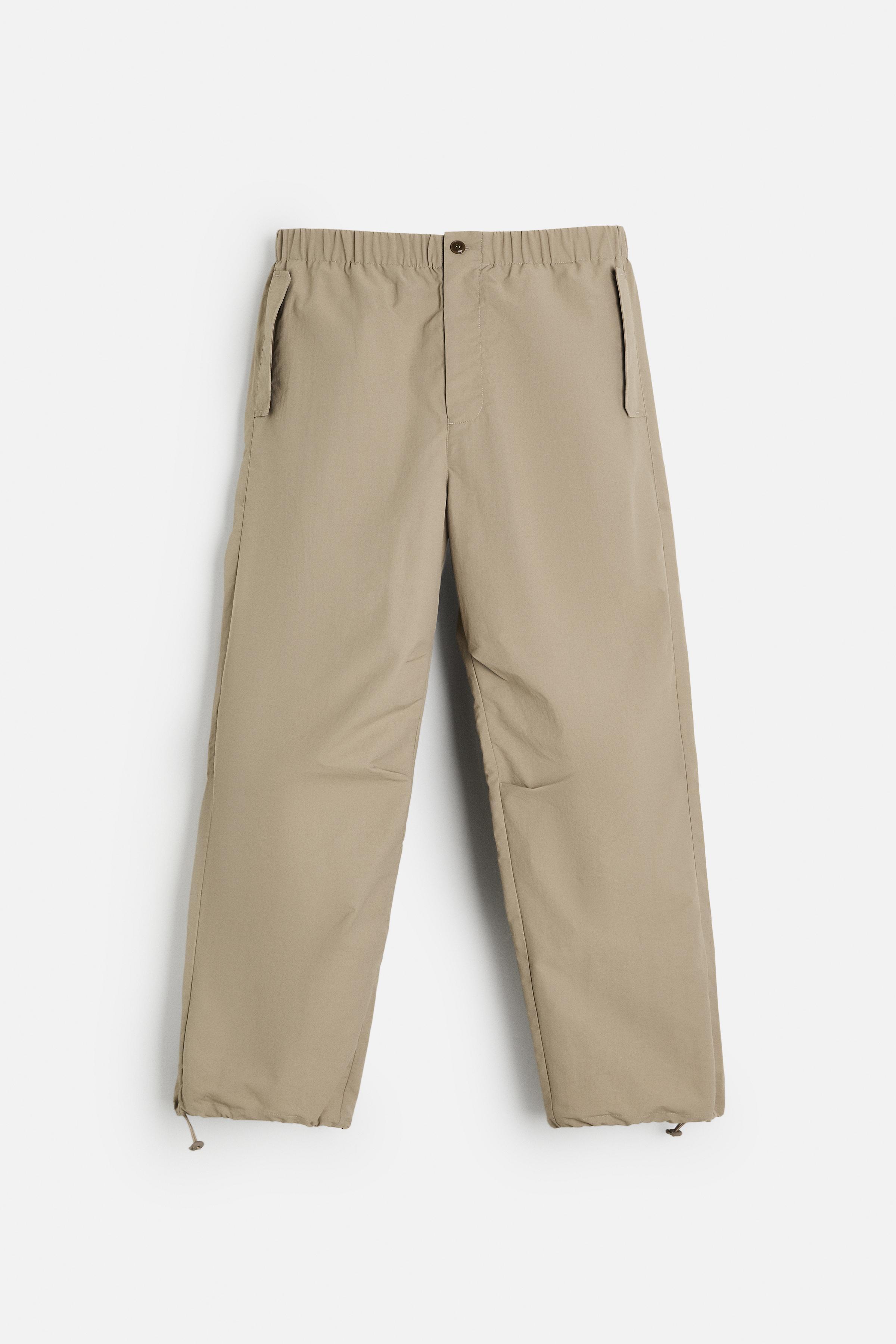 TECHNICAL WATER REPELLENT PARACHUTE PANTS Product Image