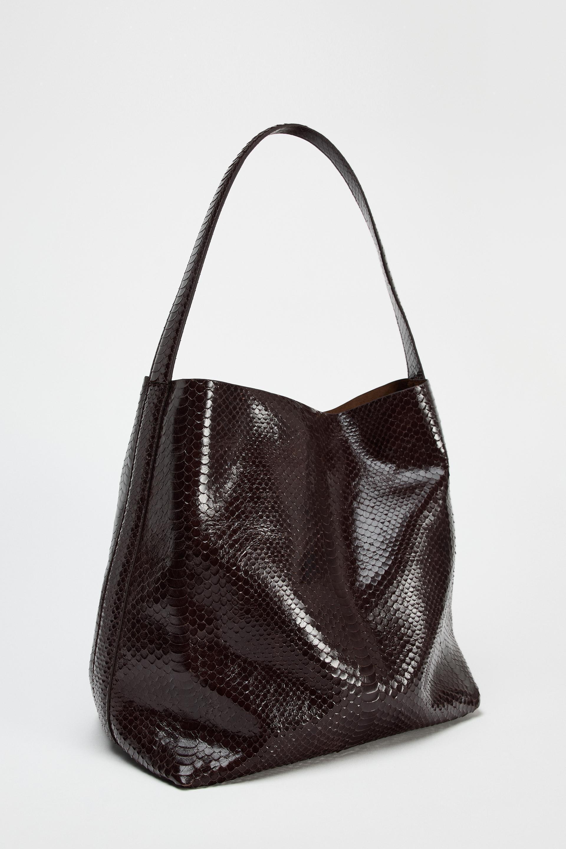 EMBOSSED LEATHER MAXI BUCKET BAG Product Image