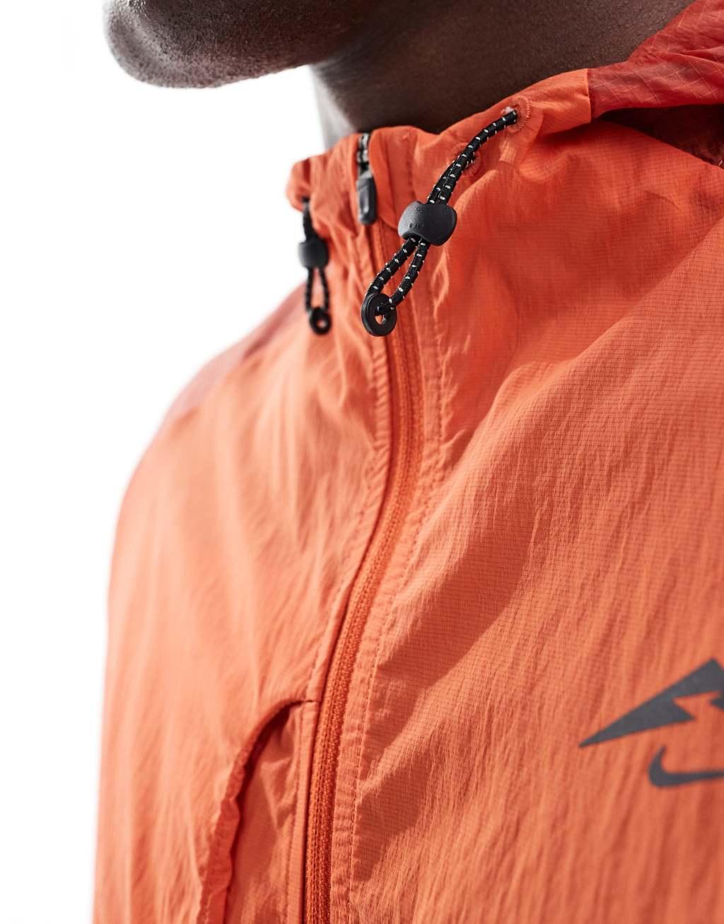 Nike Running Trail Aireez jacket in orange Product Image