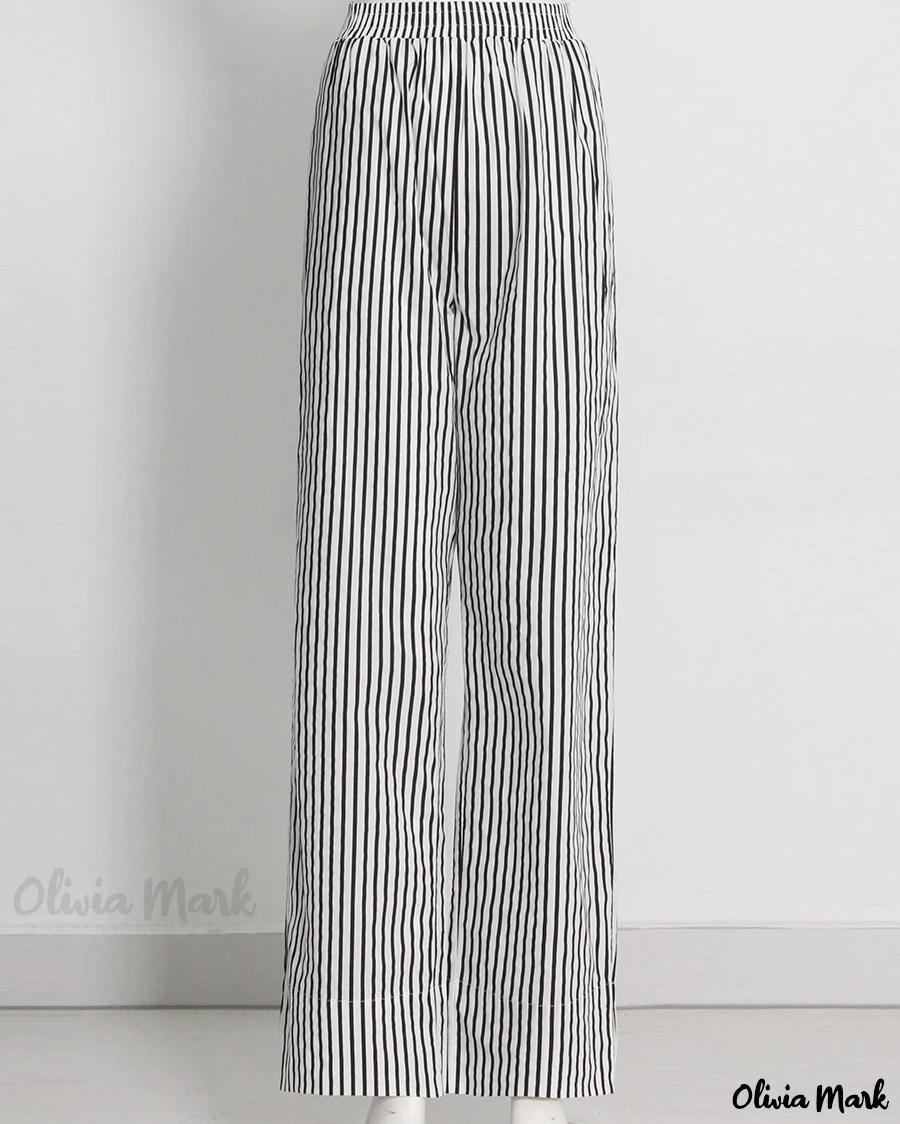 Olivia Mark – Chic Black and White Striped Off-shoulder Blouse and High-waisted Straight-leg Pants Set Product Image